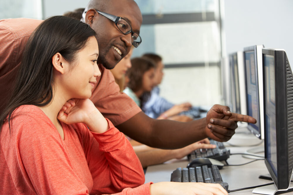 Digital Navigator helping with computer skills
