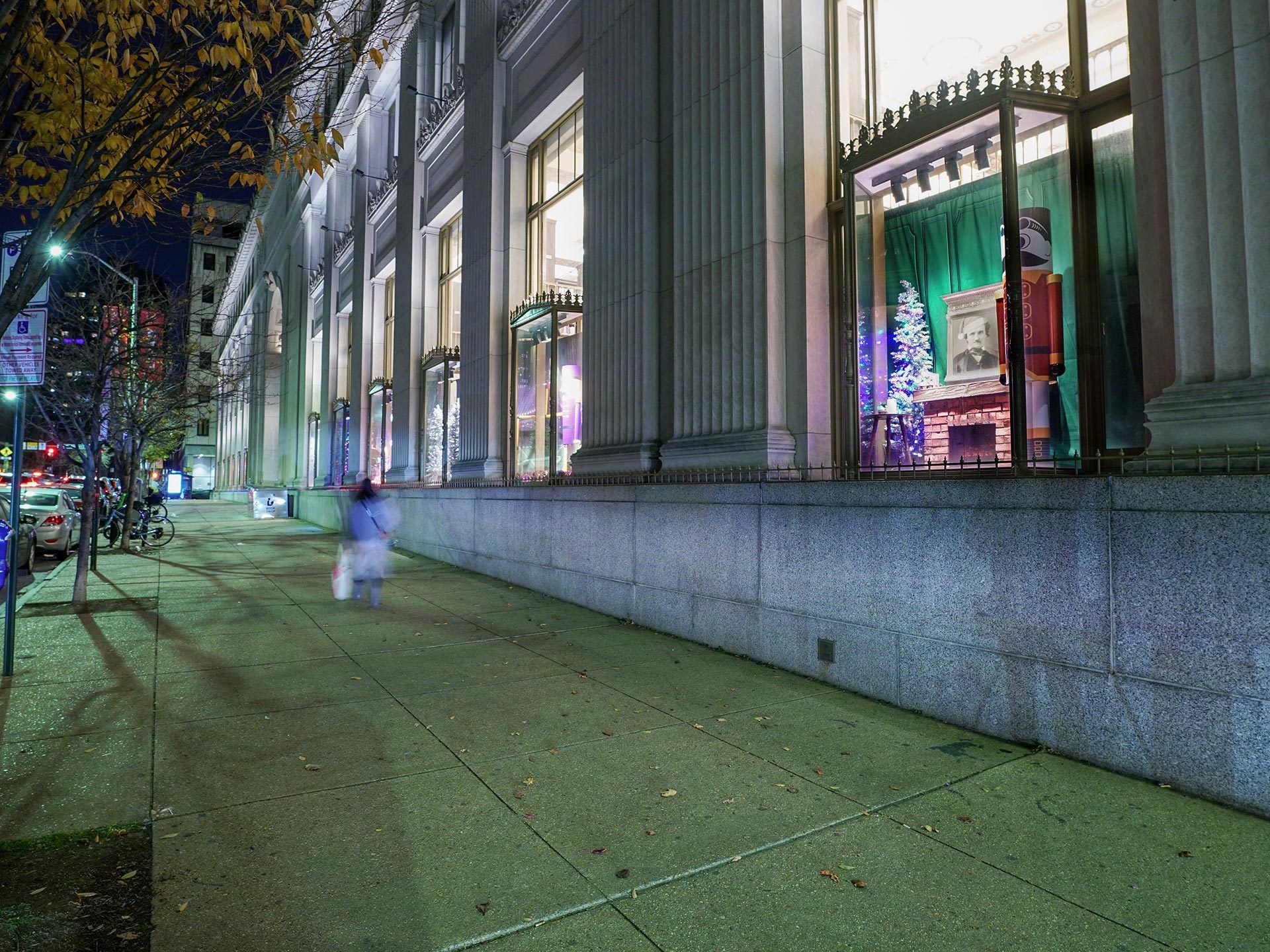 winter windows decorated at Pratt Central Library at night