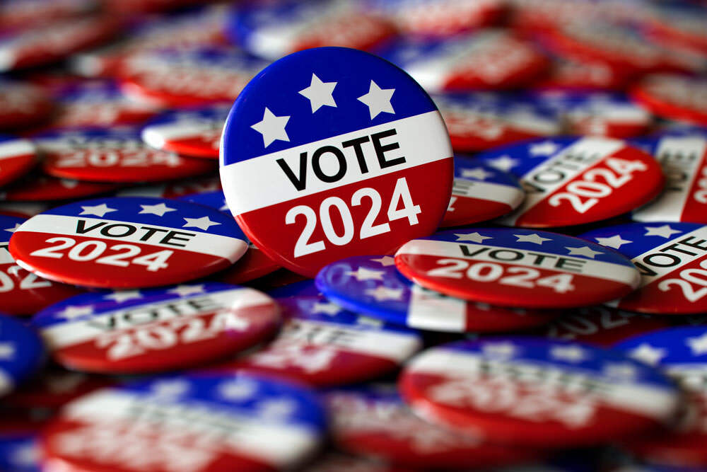 red, white, and blue buttons that read "Vote 2024"