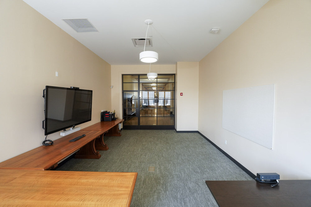 Artist in Residence studio at Pratt - L-shaped table layout