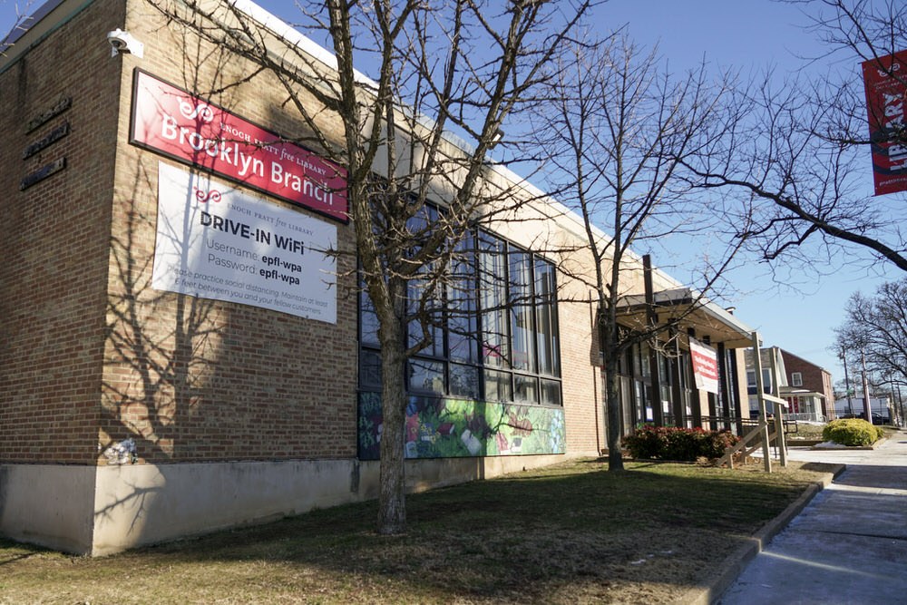 Brooklyn branch exterior during renovations - building corner with WiFi sign