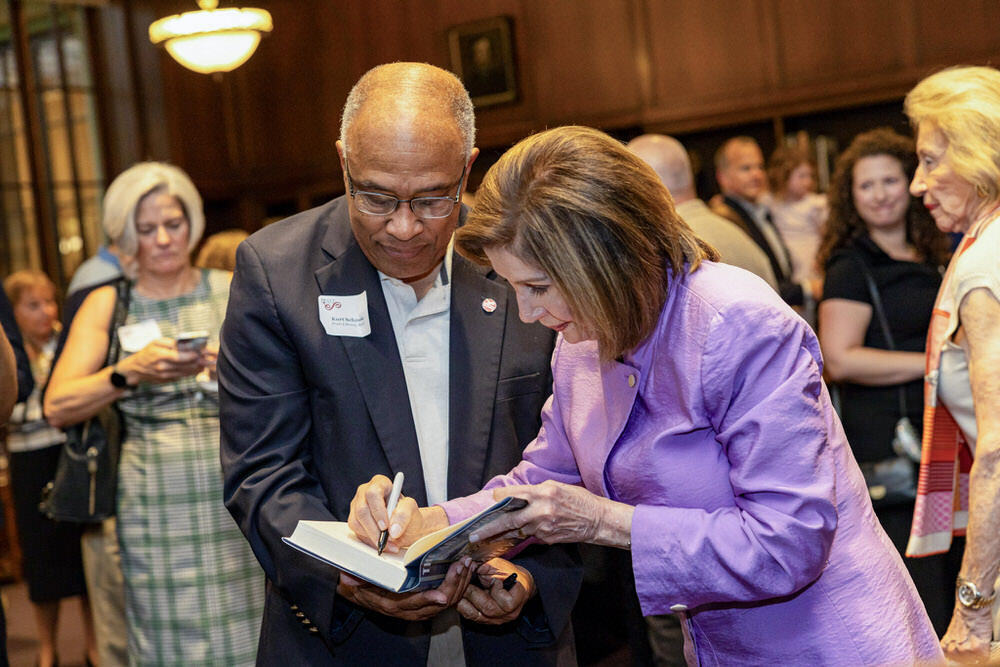 Pratt Society event with Nancy Pelosi signing her book for Kurt Schmoke