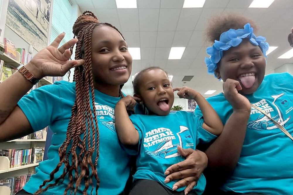 Summer Break Baltimore 2024 participants adults with tshirts having fun