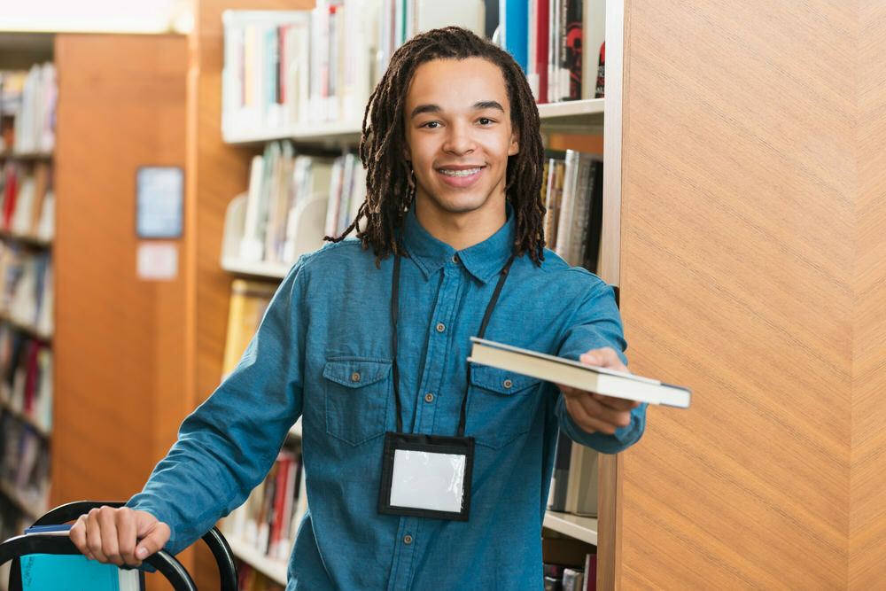 YouthWorks Enoch Pratt Free Library   Teen Working In Library 