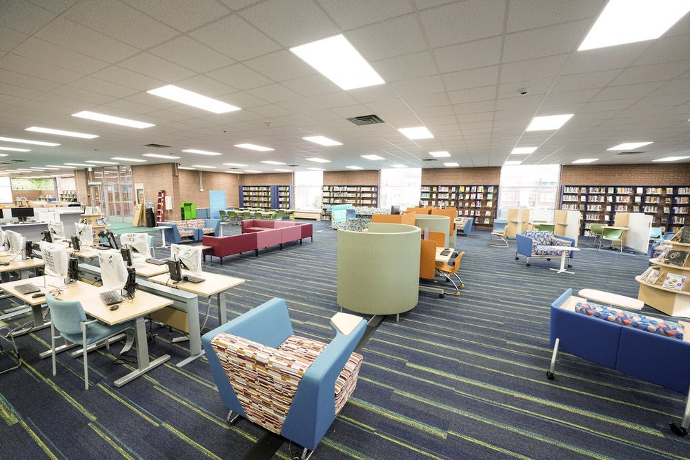 Herring Run after 2024 renovation - wide room view with lights and furniture