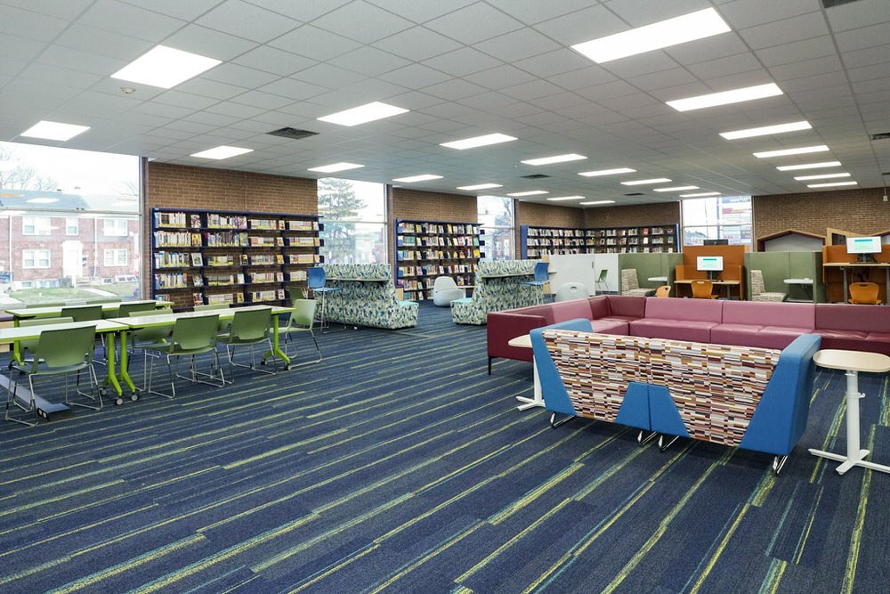 Herring Run after 2024 renovation - wide room view with furniture and windows